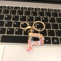 Letter P keychain pendant with colorful heart glitter in transparent resin with gold ring - Letter P
