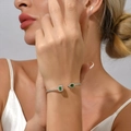 Adjustable silver bangle with emerald cut green gemstones and micro-pave crystals - Green