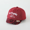 Detail of red faux suede kids cap with leopard brim and Los Angeles embroidery - 52cm (2-5 Years) / 1920 - Wine Red