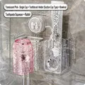 Pink wall-mounted electric toothbrush holder set with cup and suction cup attachment - 1 Cup (Pink) + Bow + Dispenser + Rabbit