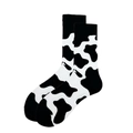 Fashionable mid-calf crew socks featuring classic black and white cow spot print pattern - Black White Cow Print