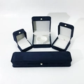 Detail of dark blue velvet jewelry box set with white satin lining and pearl clasp decoration - Pearl Buckle Blue|pearl Buckle Blue; Waist Ring Box-tight Waist Ring Box