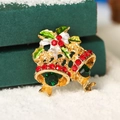 Vintage gold Christmas bell brooch with red rhinestones and green gems in festive setting - Christmas Bell (Multicolor)