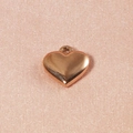 Polierter goldener Herzanhänger aus Edelstahl mit glatter, glänzender Oberfläche - Klein / Roségold