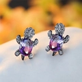 Ocean-themed sea turtle stud earrings with gradient purple gems and sparkling crystals - Black Gold Plated Rose Blue Zircon