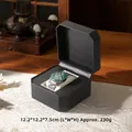 Black PU leather octagonal watch box with soft ivory cushion and textured finish - Wood Grain Black