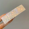Detalle de una pinza para el cabello de acetato rectangular con textura nacarada blanca - Pasador de Resorte Rectangular (Estilo 1)