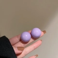 Close-up of a glossy purple sphere stud earring held by a hand for size comparison - 9# Silver Pin - Purple Ball (Glossy Paint)