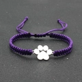 Handmade purple woven rope bracelet featuring a silver paw print charm for women - Purple