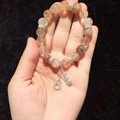 Golden rutilated quartz bead bracelet with sparkling double gourd charms and silver spacers - Silver and Coffee