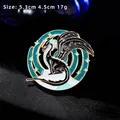 Spilla vintage drago nero in smalto su sfondo galassia a spirale verde acqua e stelle - Drago Nero e Nebulosa