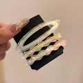 Iridescent acetate hair clip set with oval and wavy barrettes on display card - Iridescent White Set