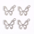 Macro view of silver butterfly pendants with white zircon stones for jewelry making - Silver Butterfly