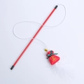 New Year themed cat teaser wand featuring a red fortune bag, golden bell, and white feather - Money Bag