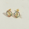 Detail of gold oval studs with Virgin Mary relief and colorful zircon stones surrounding it - Gold-Multicolor Zirconia