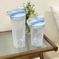 Frosted light blue protein shaker bottle with scale and mixing ball for fitness and sports - Blue