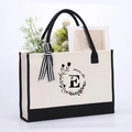 Beige cotton canvas tote bag with black handles and floral letter E summer vibe print - Letter-E
