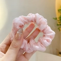 Detail of a pink floral organza scrunchie held by hand with a soft blurred background - Pink Lace Double Layer Small