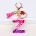 Letter Z keychain with pink tassel, heart charm and purple glitter resin finish - Letter Z