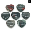 Set of seven heart-shaped natural green stone ornaments with red speckled patterns - African Blood Stone