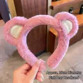 Detail view of pink plush bear ear headband with a 15cm diameter for daily skincare - Hair Hoop-Pink Bear