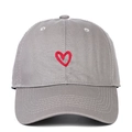 Close-up of a grey cotton baseball cap featuring detailed red heart embroidery on front - Red Heart Embroidery / Gray