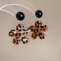 Macro detail of leopard print flower earrings with black spherical studs and silver hooks - Flower Shape Style (Silver Needle-Coffee-Flower)