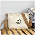 Minimalist off-white canvas crossbody bag with brown strap and black smile pattern - Smile Face Style / Beige