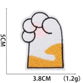 Detail showing cartoon cat paw embroidery patch dimensions 5cm by 3.8cm with weight 1.2g - No.30 (Orange Pink Paw)