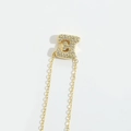 Golden necklace with letter E pendant featuring pave-set cubic zirconia crystals - Letter E