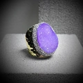 Close-up of a purple druzy quartz ring with a hammered gold-tone textured band - Adjustable Open / Purple