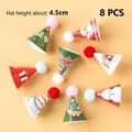 Set of 8 mini Christmas party hats featuring Santa and snowman patterns with pom-poms - Mini Pom-pom Christmas Hat A 8pcs Kit