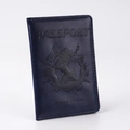 Close-up of dark blue PU leather passport cover with world map and landmark embossing - Dark Blue