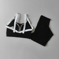 Flachbild-Detail eines schwarzen Yoga-Sets mit Cross-Back-Sport-BH und Leggings mit hohem Bund - S / Schwarz & Weiß