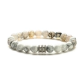Detailed macro view of white turquoise and dragon vein agate beaded bracelet with silver beads - Dragon Vein Agate
