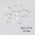 Macro detail of 5x7mm silver star nail charms with polished alloy finish MZH-A510 - Silver Starburst Shape (A510)