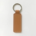 Rectangle brown PU leather keychain with stitching and silver metal ring accessory - Brown
