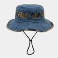 Detail of washed blue denim bucket hat with newspaper print lining and windproof drawstring - One Size / Blue