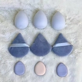 Macro shot of assorted blue and beige makeup sponges in teardrop and triangle shapes - Grey 9-Piece Set
