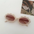 Kids flower frame sunglasses in cream beige with brown gradient lenses and oval design - Beige