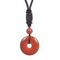 Detailed view of natural red stone pendant with dark brown braided rope and beads - Red Jasper Necklace