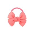 Close-up of pink grosgrain ribbon bow hair tie with elastic band on white backdrop - Watermelon red