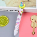 Multicolor unicorn retractable ballpoint pen with pink unicorn character on top - Moon Unicorn - White
