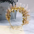 Handmade golden leaf headband featuring natural pink crystal clusters in bohemian style - Rose Quartz Gold Wire Gold Leaves