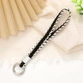 Dragonne tissée élégante en noir, blanc et or avec un fermoir en métal pour accessoires - Largeur 12mm / Noir et Blanc