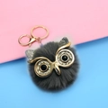 Dark grey owl pompom keychain with sparkling rhinestone eyes and golden hardware clip - 8cm / Dark Gray