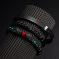 Detailed view of 3-piece men's bracelet set with leopard heads and woven leather cord - Leopard Bracelet Three-piece Set In Black