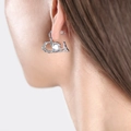 Silver irregular heart-shaped stud earring with clear crystal on female model - Silver Color White Stone