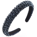 Macro shot of handmade baroque headband with luxury navy crystal beads and sponge base - Blue