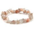 Macro view of multi-color irregular natural stone beads on an elastic stretch bracelet - Sunstone